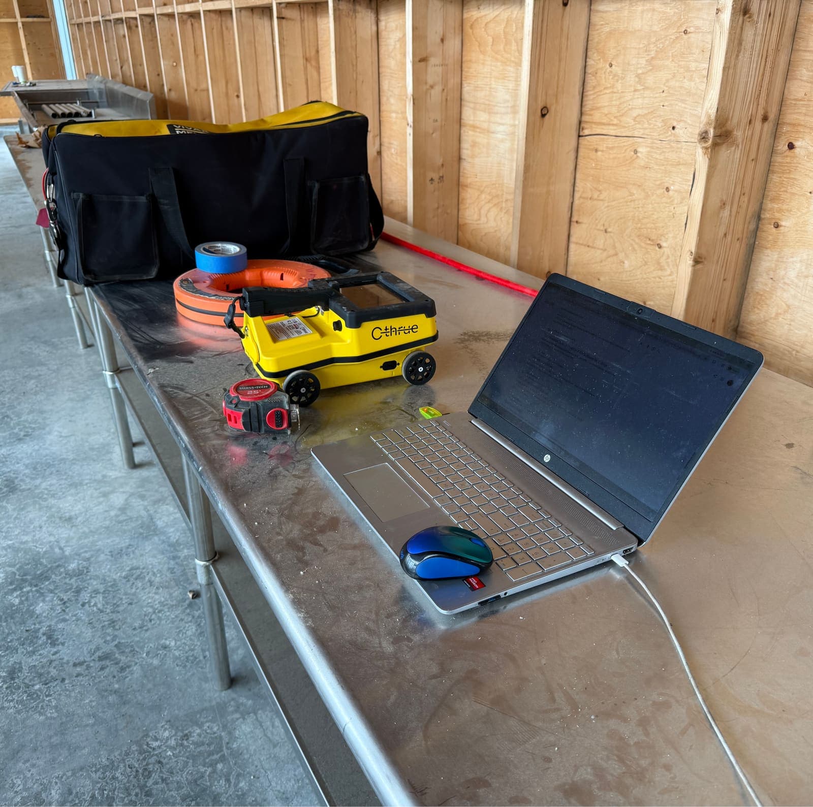 Concrete GPR scanner and field laptop set up for on-site scan processing