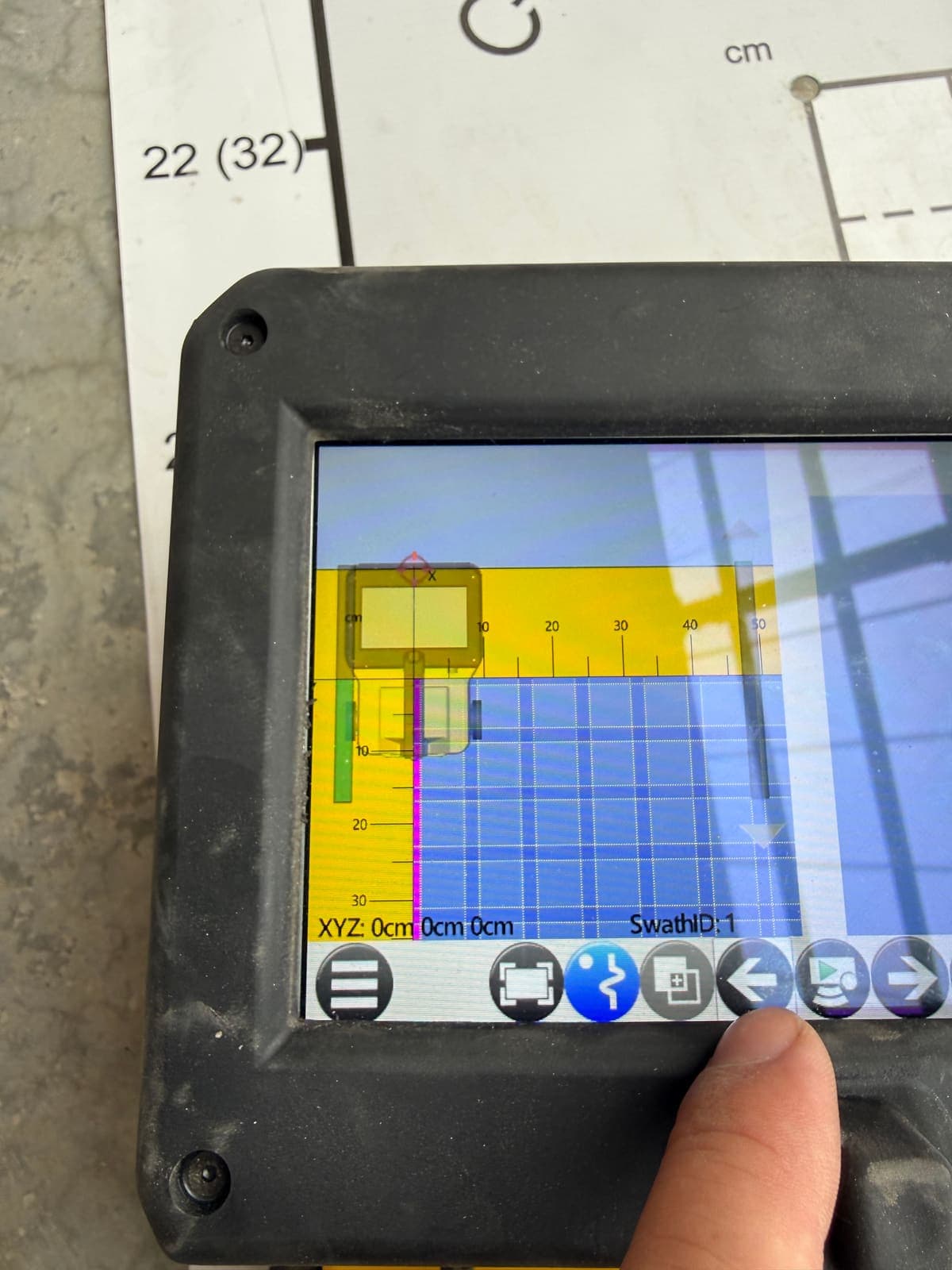 Reviewing the live scan grid on the concrete scanner's display