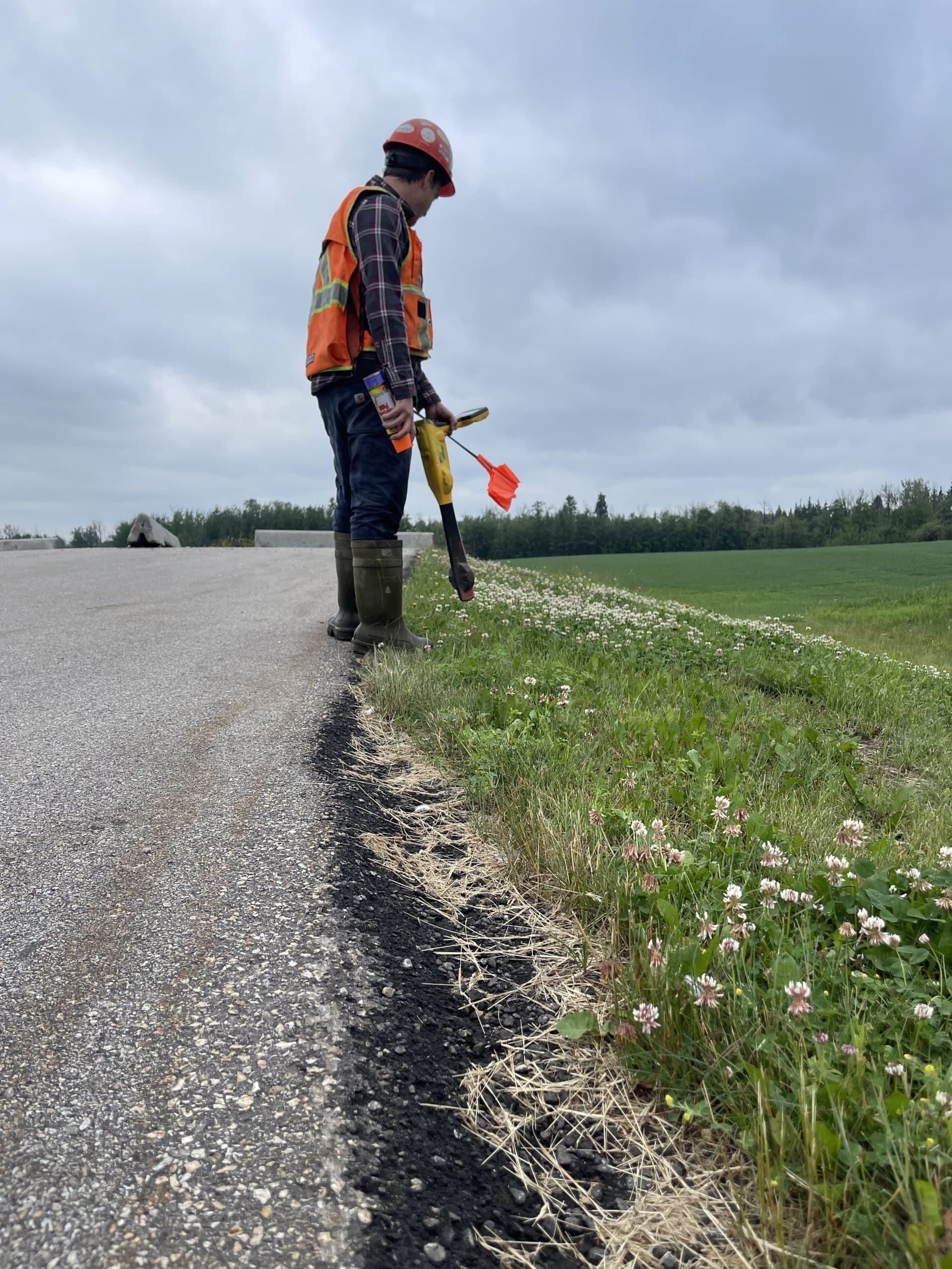PCI locating equipment marking utilities ahead of ground disturbance work in Edmonton