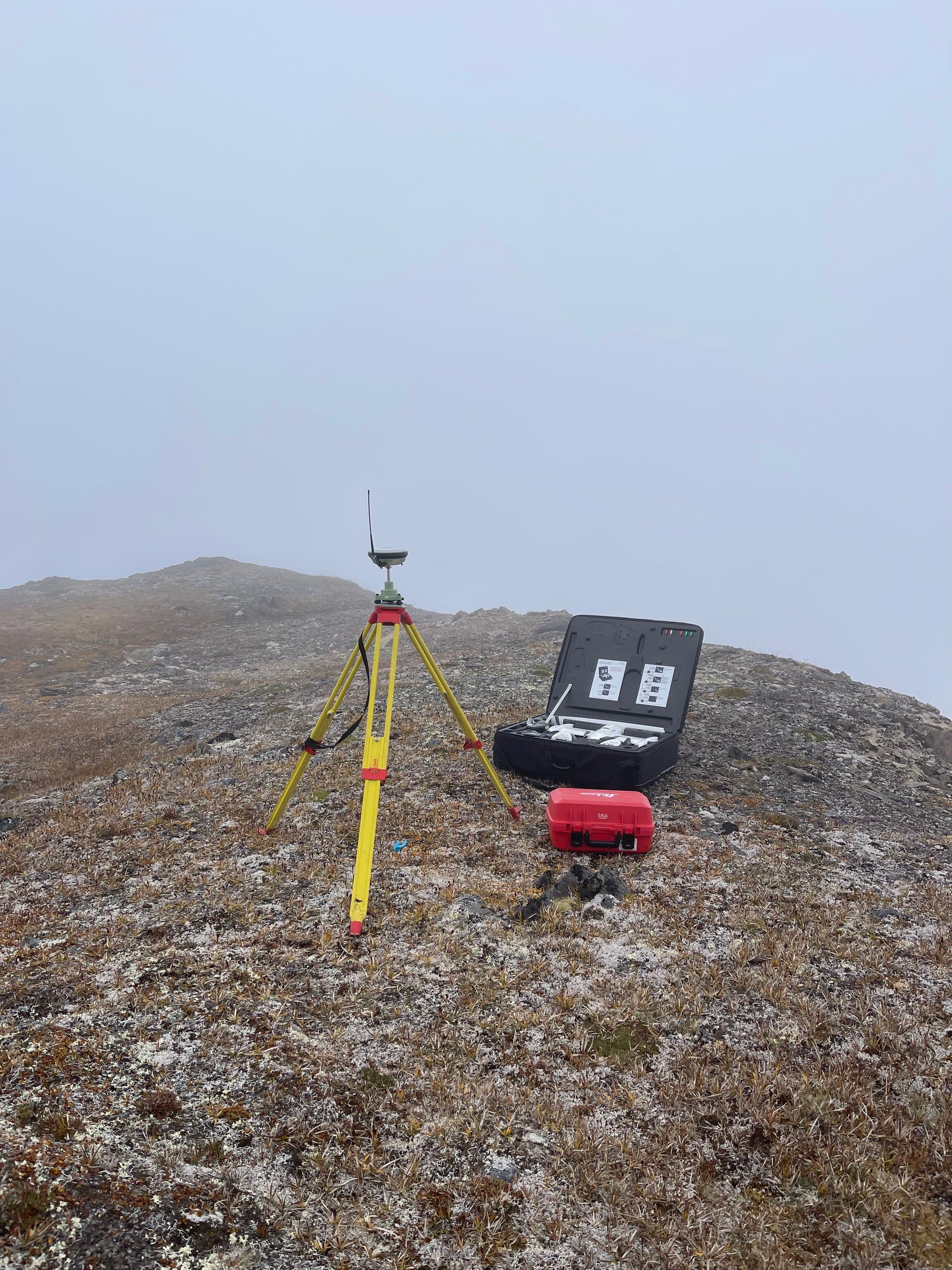 GNSS base station on a rocky mountain summit