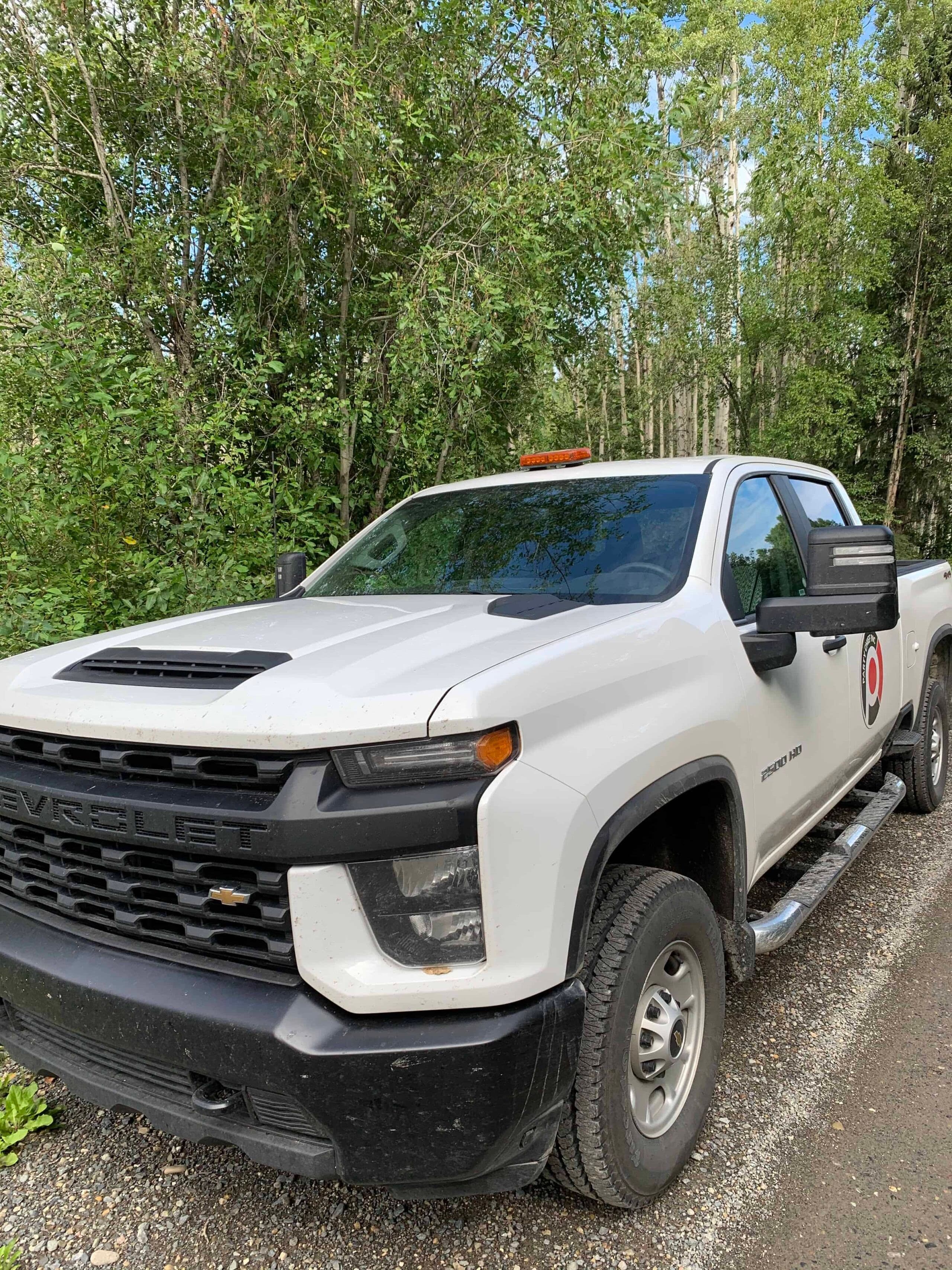 Crew truck on a quiet forest road