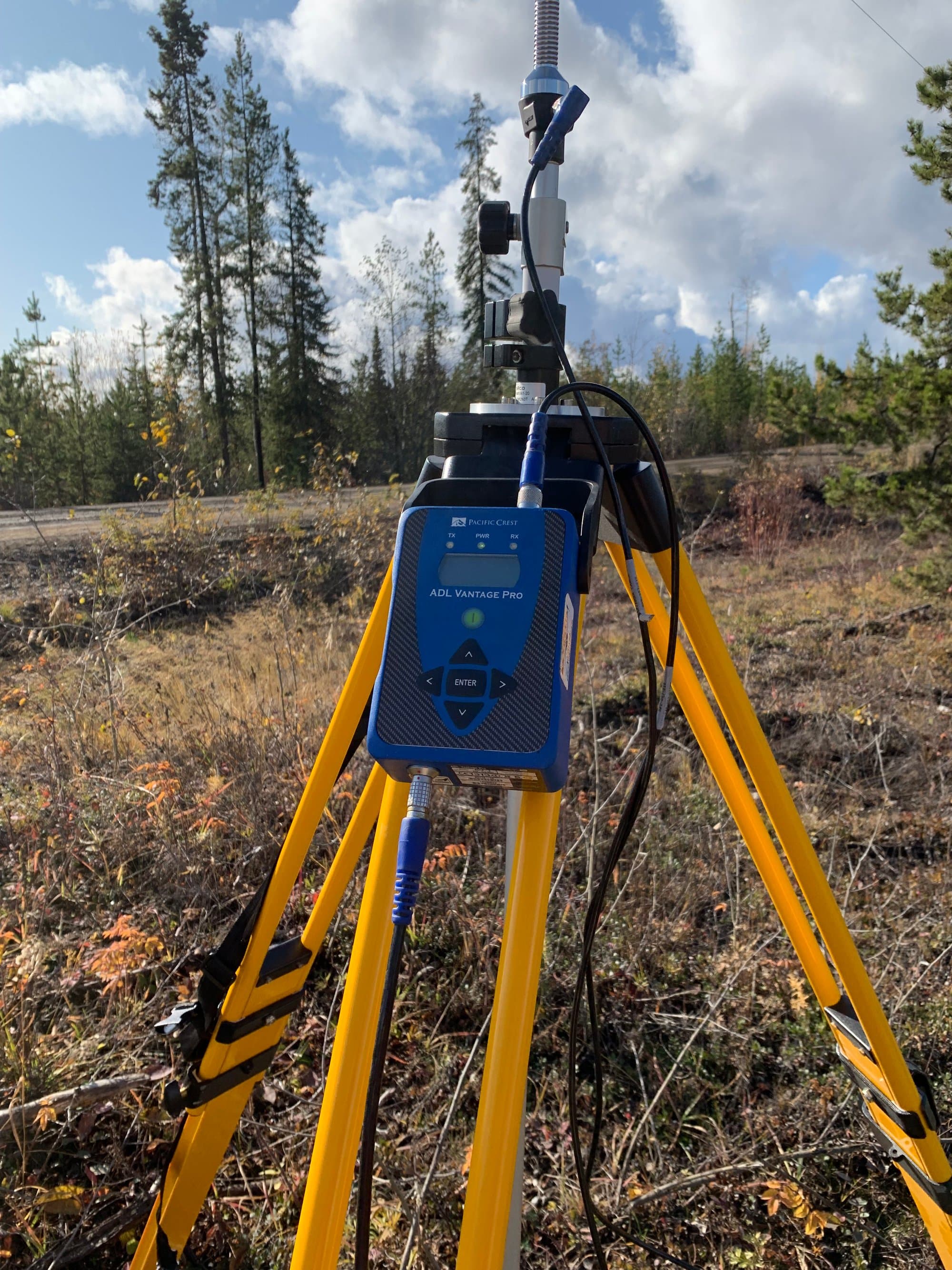 GNSS radio link mounted on a tripod