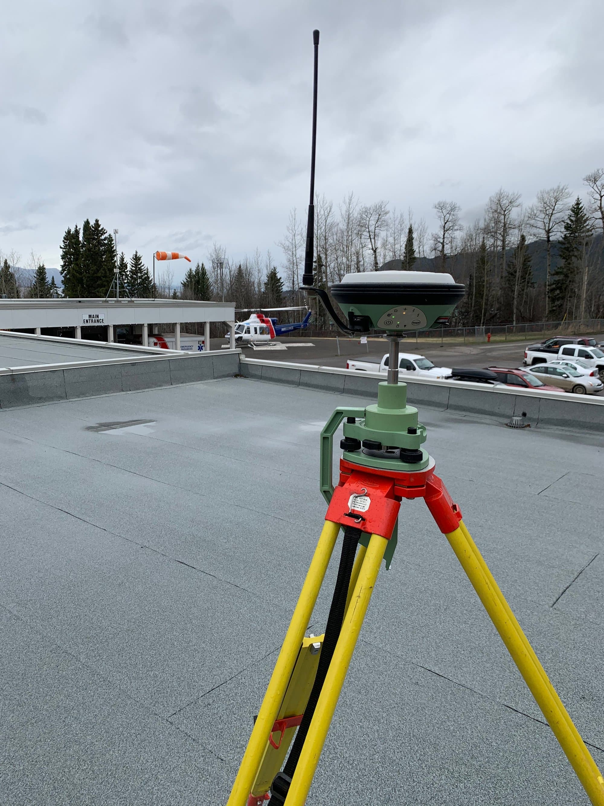 GNSS control point on a rooftop parkade in the city