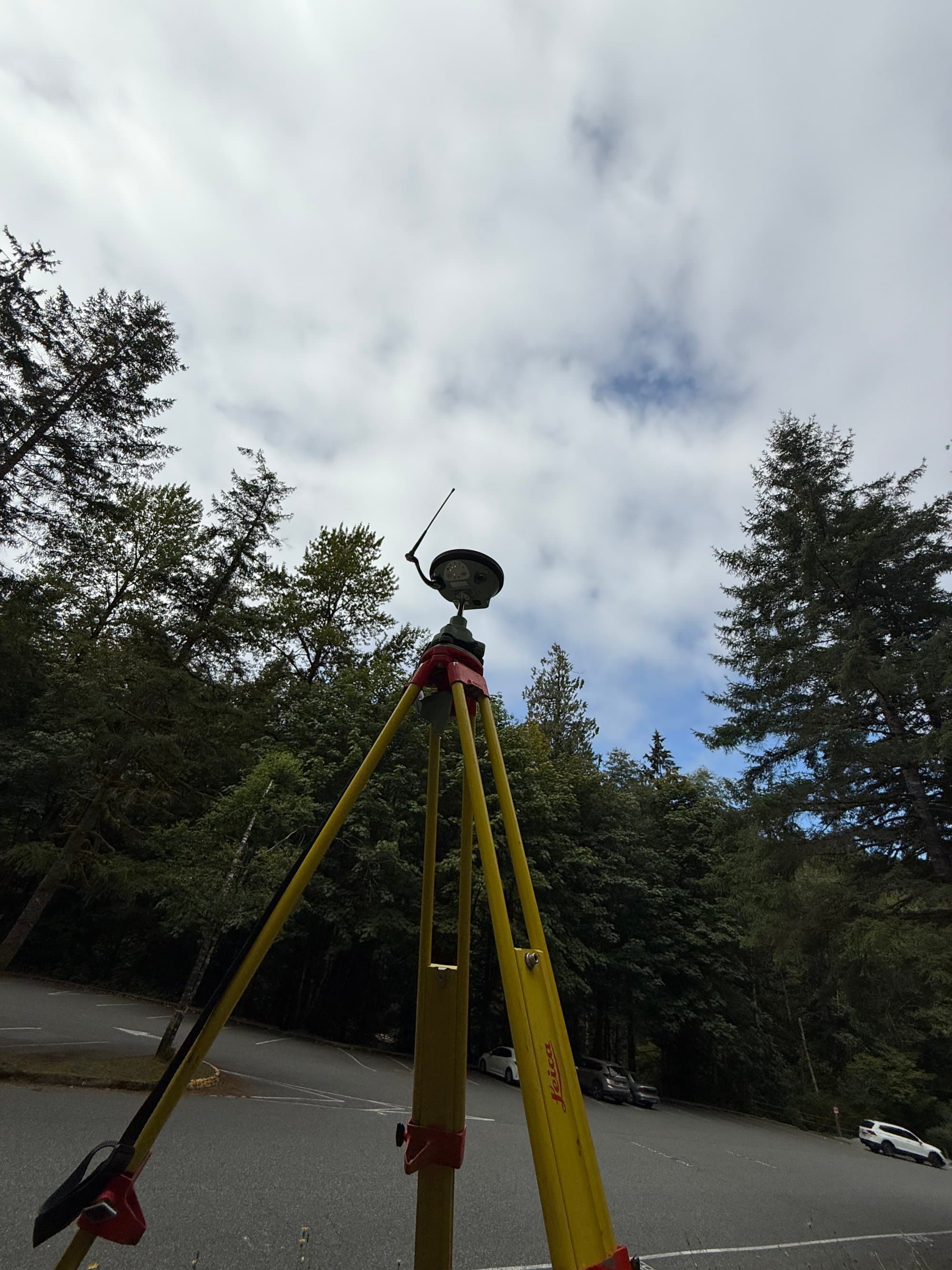 GNSS antenna against the treeline and open sky