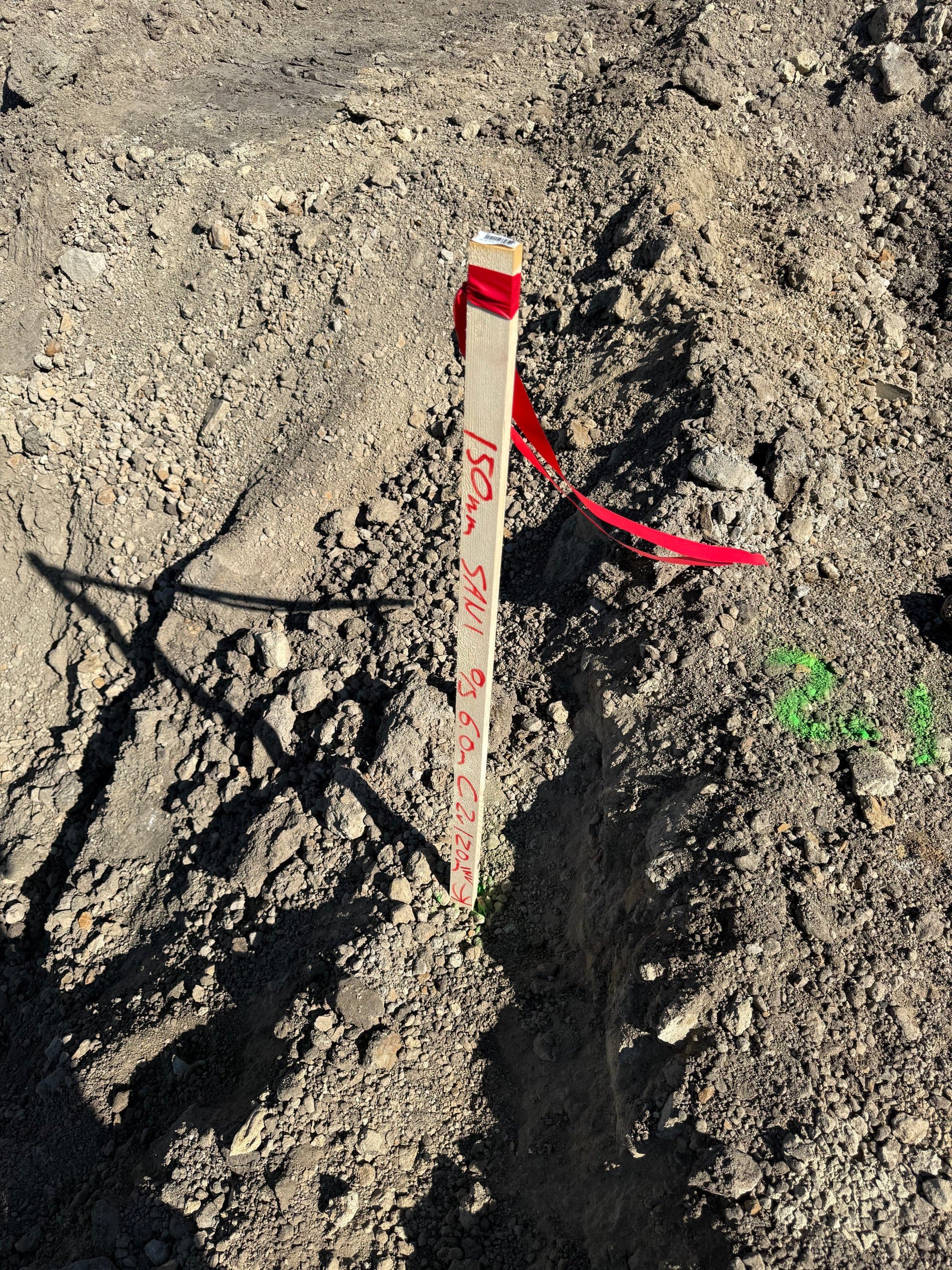 Grade stake with cut and fill markings