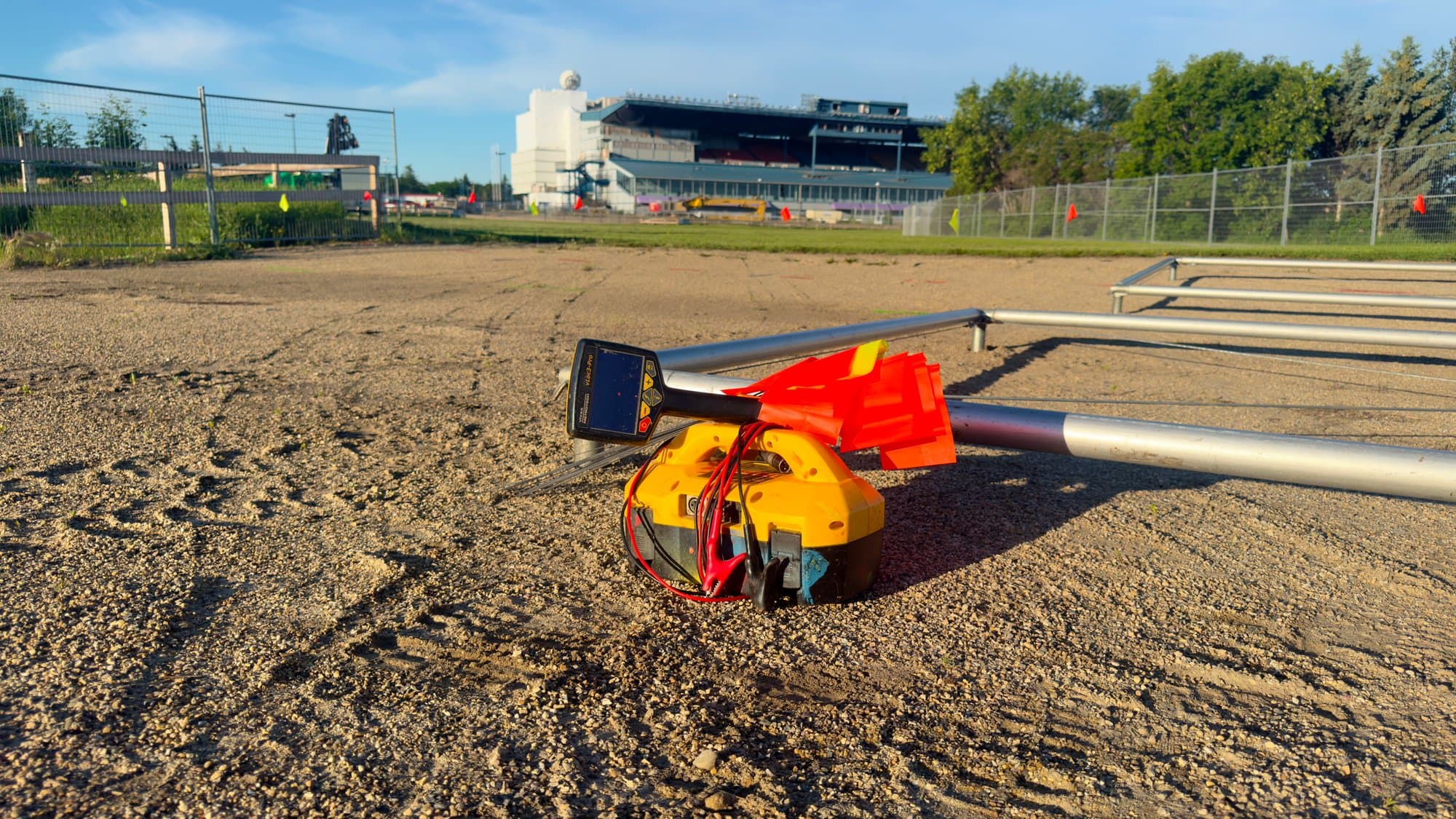 Monitoring well auger work at a racetrack site