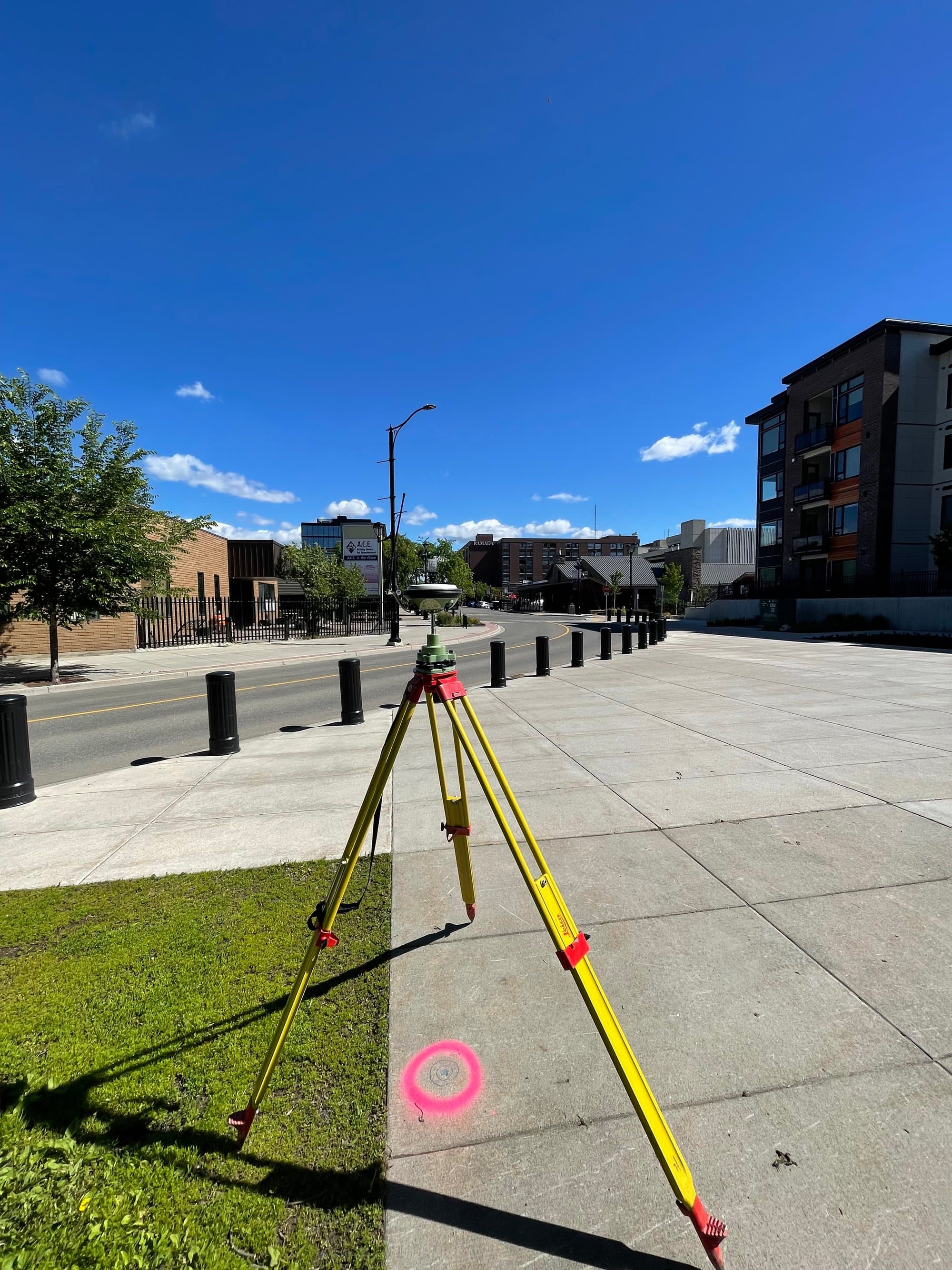 Total station on a downtown sidewalk