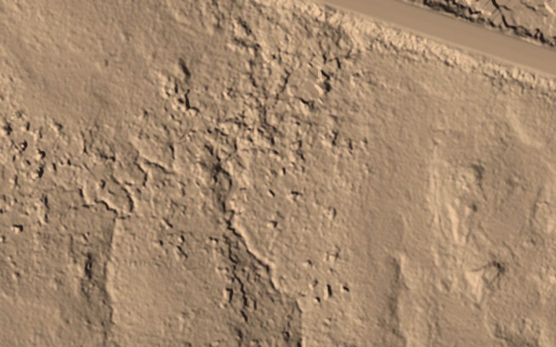 Hillshaded bare-earth terrain model from drone LiDAR: a road grade crossing wetland, with drainage lines and microtopography visible