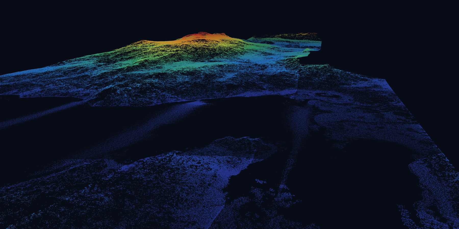 The same drone LiDAR view with only ground-classified points shown: the forest removed, the terrain beneath it revealed