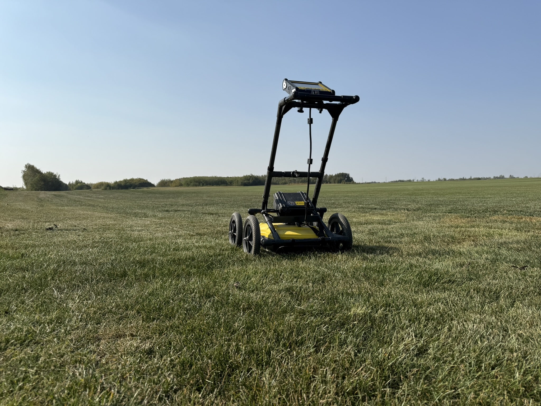 Our ground penetrating radar in a field looking for buried high pressure gas lines.