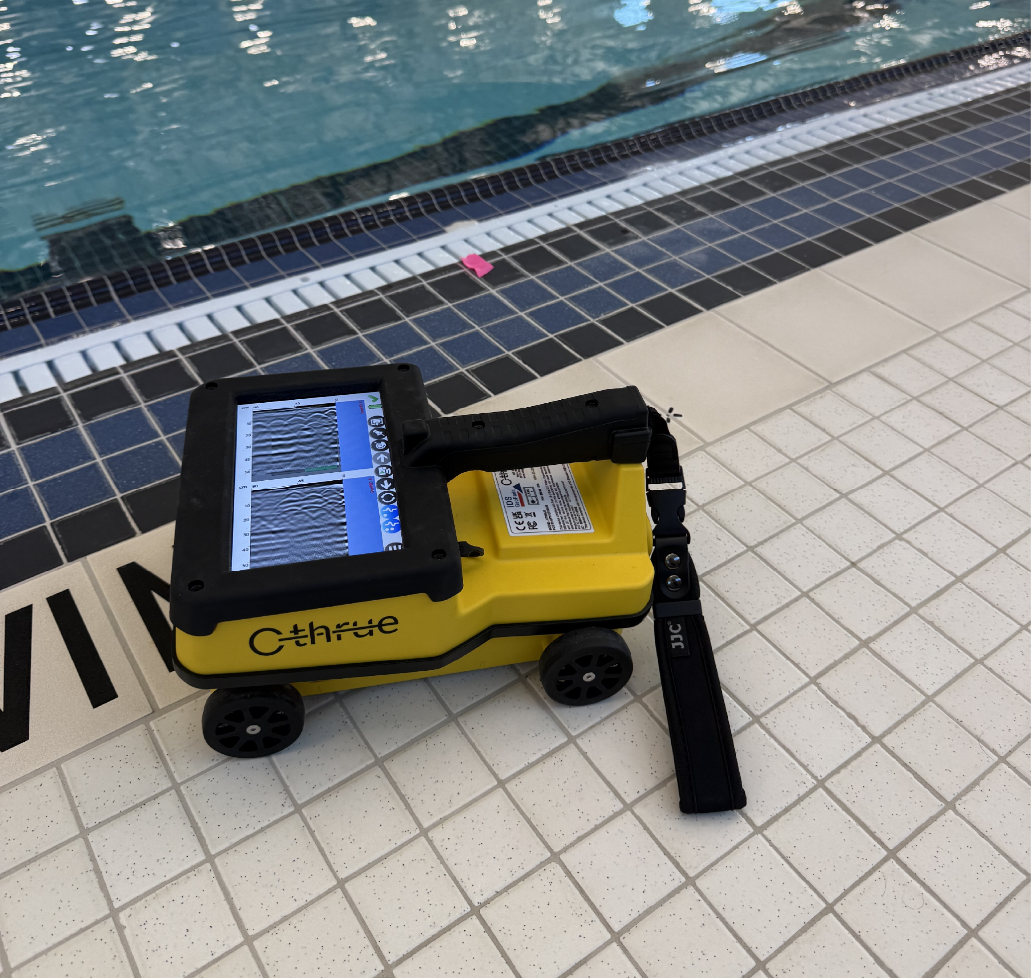 GPR scanning equipment set up on an indoor pool deck in Edmonton for concrete and subsurface investigation